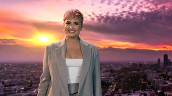 Demi Lovato says she cut her hair because she 'used to hide behind' it