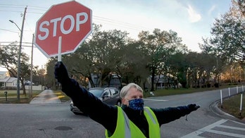 Florida crossing guard hailed a hero after saving 7-year-old from getting struck by car