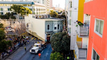 San Francisco home is rolled through city's streets to a new location