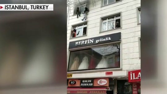 Mother in Istanbul throws 4 children out apartment window to save them from fire, video shows