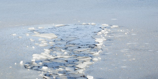 Chad Schmidt claims he was out on the lake in his fish house on Monday evening when he "heard something out of the ordinary" that turned out to be the surface of the ice giving way to a nearby pickup truck.