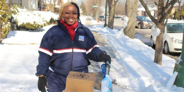 Shonda Lemon, 34, works at her job as a USPS postman in Chicago (Photo courtesy of Shonda Lemon / Fox Television Stations)