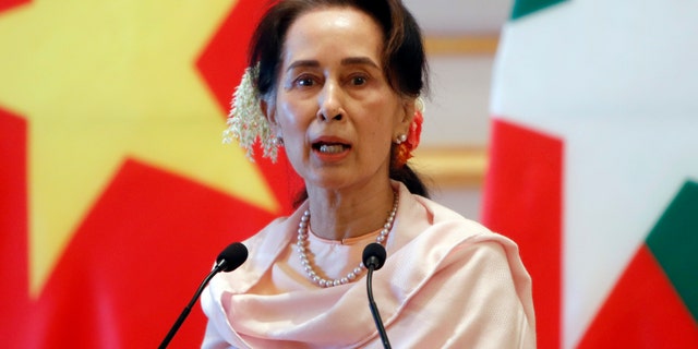 In this Dec. 17, 2019, file photo, Myanmar's leader Aung San Suu Kyi speaks during a joint press conference with Vietnam's Prime Minister Nguyen Xuan Phuc after their meeting at the Presidential Palace in Naypyitaw, Myanmar. Reports says Monday, Feb. 1, 2021 a military coup has taken place in Myanmar and Suu Kyi has been detained under house arrest. (AP Photo/Aung Shine Oo, File)