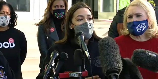 Rep. Alexandria Ocasio-Cortez, D-N.Y., speaks at the Houston Food Bank on Feb. 20, 2021, where she announced raising $3.2 million in relief aid funds.
