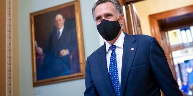 Sen. Mitt Romney, R-Utah, arrives at the Senate for a roll call vote to confirm Antony Blinken, President Joe Biden's nominee to be secretary of state, at the Capitol in Washington, Tuesday, Jan. 26, 2021. (AP Photo/J. Scott Applewhite)