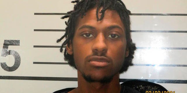 Jarron Deajon is in custody as a suspect, after six people, including five young children, were shot to death early Tuesday at a home in Muskogee, Okla.