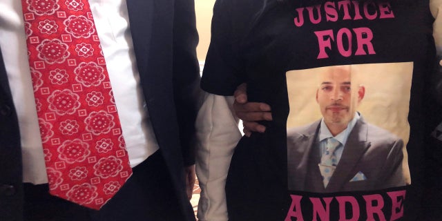 Andre Hill, fatally shot by Columbus police on Dec. 22, is memorialized on a shirt worn by his daughter, Karissa Hill, on Thursday, Dec. 31, 2020, in Columbus, Ohio. (AP Photo/Andrew Welsh-Huggins)