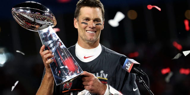 Tampa Bay Buccaneers quarterback Tom Brady hoists the Vince Lombardi trophy after Super Bowl 55 against the Kansas City Chiefs Feb. 7, 2021, in Tampa, Florida. Tampa Bay won 31-9.