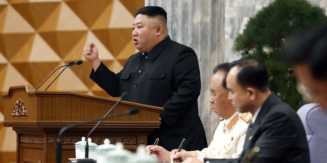 In this photo provided by the North Korean government, North Korean leader Kim Jong Un, left, attends a meeting of the Korean Workers' Party Central Committee in Pyongyang, North Korea on Monday, February 8, 2021 ( Korean Central News Agency / Korean News Service via AP)