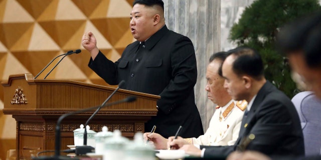 In this photo provided by the North Korean government, North Korean leader Kim Jong Un, left, attends a meeting of the Korean Workers' Party Central Committee in Pyongyang, North Korea on Monday, February 8, 2021 ( Korean Central News Agency / Korean News Service via AP)