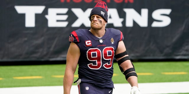 In this December 27, 2020 file photo, Houston Texans defensive end JJ Watt walks the field before the NFL match against the Cincinnati Bengals in Houston. 