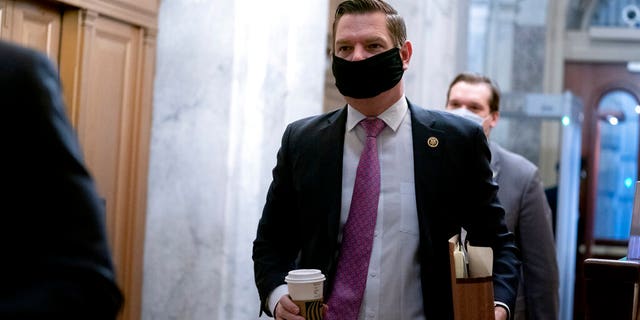 Rep. Eric Swalwell, D-Calif., arrives at the start of the fifth day of the second impeachment trial of former President Trump, Saturday, Feb. 13, 2021 at the Capitol in Washington. (Stefani Reynolds/Pool via AP)