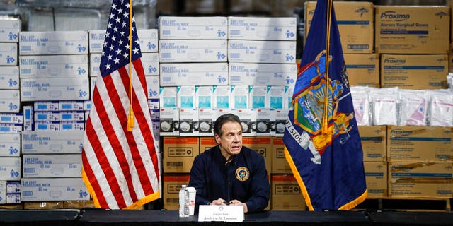FILE: Governor Andrew Cuomo speaks during a press conference amid medical supplies at the Jacob Javits Center which will house a temporary hospital in response to the COVID-19 outbreak in New York City. 