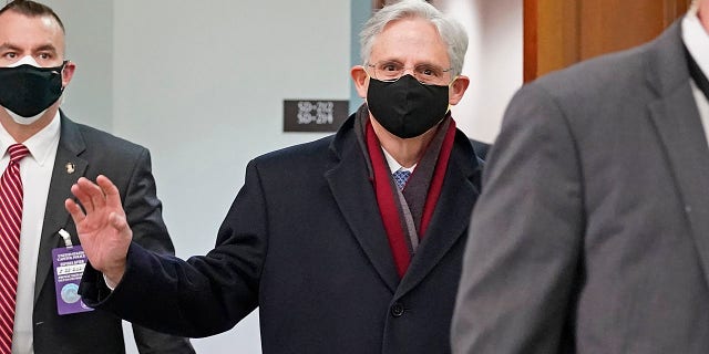 Judge Merrick Garland, President Joe Biden's pick to be attorney general, arrives on Capitol Hill for his confirmation hearing, in Washington, Monday, Feb. 22, 2021. (AP Photo/J. Scott Applewhite)