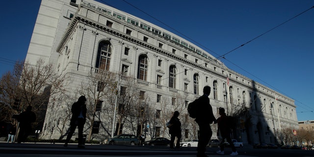 FILE - In this Jan. 7, 2020, file photo, is the Earl Warren Building, headquarters of the Supreme Court of California, in San Francisco. The California Supreme Court on Thursday, Feb. 25, 2021, upheld the state's 2018 law barring 14 and 15-year-olds from being tried as adults and sent to adult prisons even for serious crimes like murder, arson and robbery, rape or kidnapping. (AP Photo/Jeff Chiu, File)