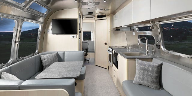 In addition to a sound proof office space, the Flying Cloud 30FB, has lifestyle amenities like a TV and kitchen. (Airstream)