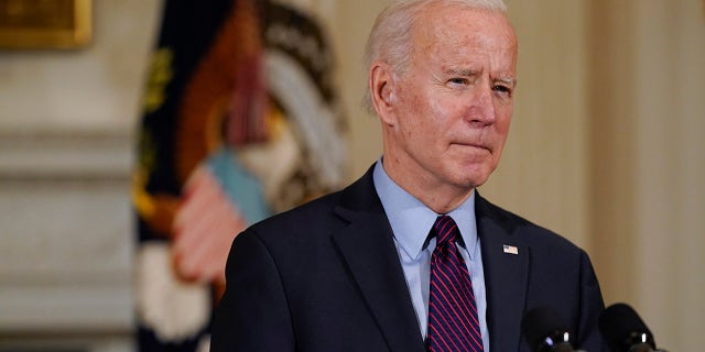 President Biden speaks about the economy in the State Dinning Room of the White House, Friday, Feb. 5, 2021, in Washington. Biden's presidency isn't yet 100 days old and he's already faced a barrage of litigation from Republican attorneys general. 