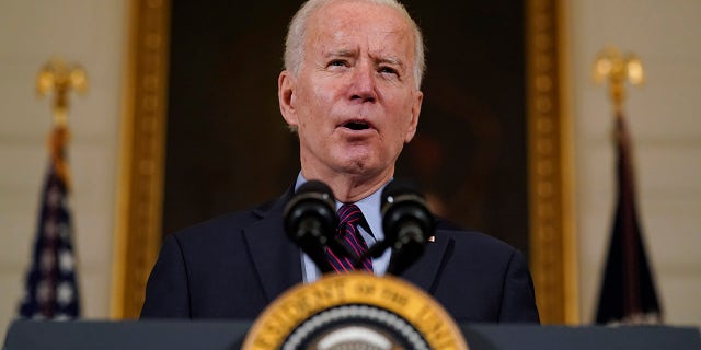 President Joe Biden speaks about the economy in the State Dinning Room of the White House, Friday, Feb. 5, 2021, in Washington. (AP Photo/Alex Brandon)