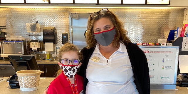 Anne Marie Stopper, right, invited Harper to be an honorary employee at the Chick-fil-A location she manages with her family.