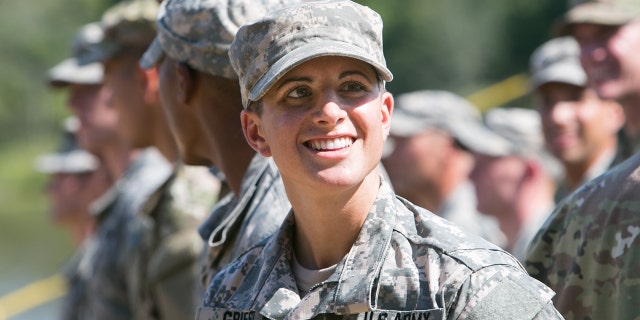 Capt. Kristen Griest smiles at the audience gathered during the graduation ceremony of the United States Army's Ranger School on August 21, 2015 at Fort Benning, Ga. (Getty Images)
