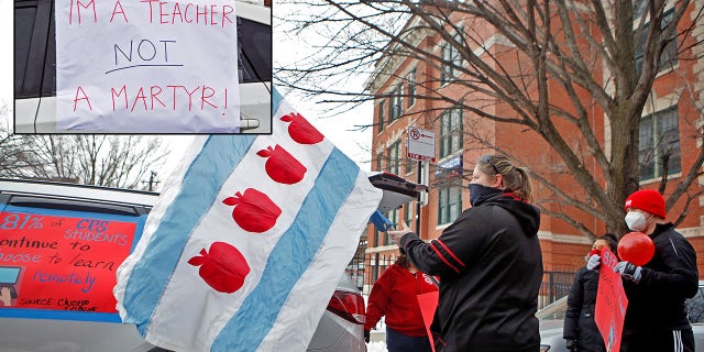 Supporters of the Chicago Teachers Union prepare for a car caravan on Jan. 30, 2021, during negotiations with Chicago Public Schools over a coronavirus safety plan agreement.