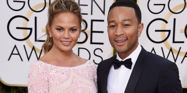 Chrissy Teigen and John Legend attended the Golden Globes together in 2015. (Photo by Frazer Harrison/Getty Images)