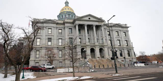 FILE—The State Capitol is shown in this file photograph taken Monday, Dec. 14, 2020, in downtown Denver. (AP Photo/David Zalubowski, File)