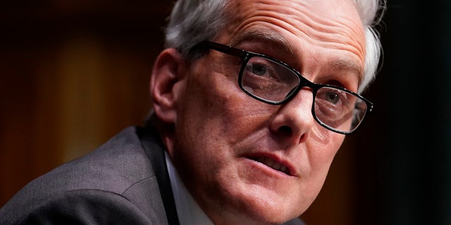 The VA, run by Secretary Denis McDonough, agreed with GAO's findings and said it would begin the work of setting up a vetting process for staff. (Sarah Silbiger/Pool via AP)
