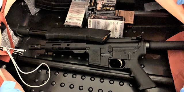 TSA officers founf the "artfully concealed" gun behind the lining of a traveler's suitcase in July at Newark Liberty International Airport.