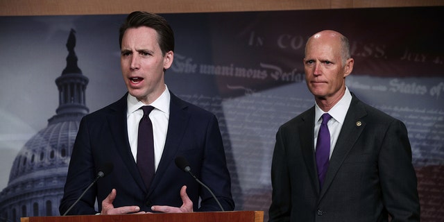 WASHINGTON, DC - APRIL 02: U.S. Sen. Josh Hawley (R-MO) (L) speaks as Sen. Rick Scott (R-FL) (R) listens during a news conference at the U.S. Capitol April 2, 2019 in Washington, DC. Scott and Hawley in conversations with Fox News on Friday both panned the idea of a GOP civil war. (Photo by Alex Wong/Getty Images)