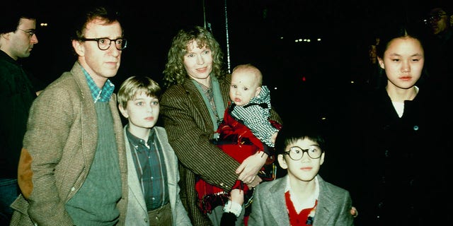 Woody Allen with Mia Farrow and children, including Soon-Yi Previn. 