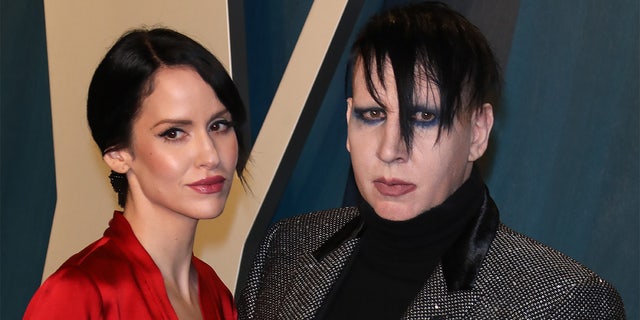 Marilyn Manson and Lindsay Usich attend the 2020 Vanity Fair Oscar party.