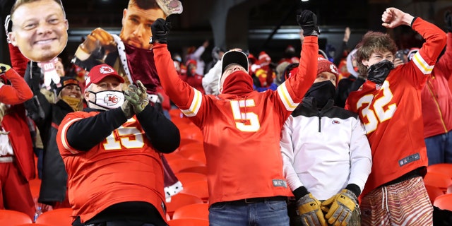 Kansas City Chiefs fans celebrate in the fourth quarter during the AFC Championship game between the Buffalo Bills and the Kansas City Chiefs at Arrowhead Stadium on January 24, 2021, in Kansas City, Missouri. (Photo by Jamie Squire/Getty Images)