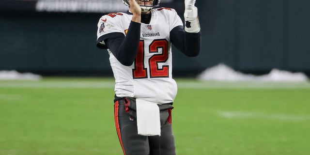 Tom Brady of the Tampa Bay Buccaneers celebrates in the fourth quarter against the Green Bay Packers during the NFC Championship game at Lambeau Field on January 24, 2021, in Green Bay, Wisconsin. (Dylan Buell/Getty Images)