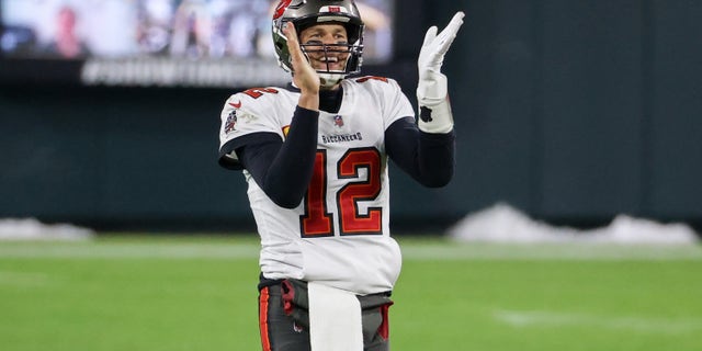 Tom Brady of the Tampa Bay Buccaneers celebrates in the fourth quarter against the Green Bay Packers during the NFC Championship game at Lambeau Field on January 24, 2021, in Green Bay, Wisconsin. (Dylan Buell/Getty Images)