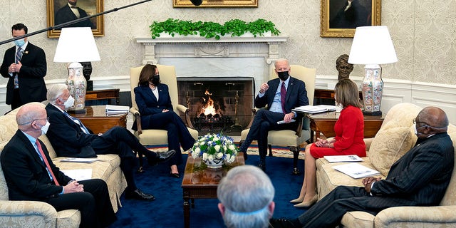 President Joe Biden and Vice President Kamala Harris meet with House Democratic leaders to discuss the coronavirus relief legislation at the White House, Feb. 5, 2021.