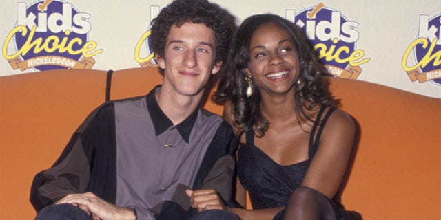 Dustin Diamond (left, pictured here with Lark Voorhies) passed away on Monday at age 44.