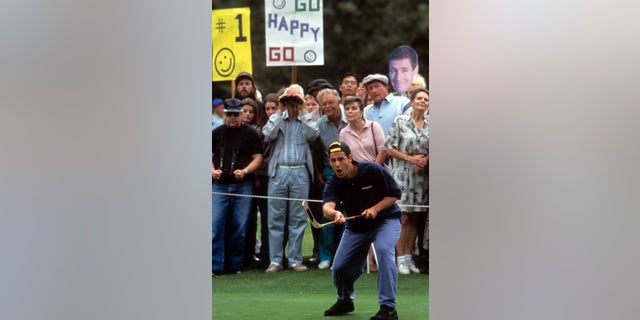 Adam Sandler plays golf in a scene from the film 'Happy Gilmore.' (Photo by Universal/Getty Images)