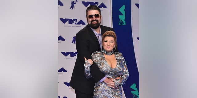 In happier times: Andrew Glennon, left, and Amber Portwood attend the MTV Video Music Awards 2017 at The Forum on August 27, 2017 in Inglewood, California.