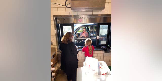 Harper even handed off a milkshake to her mother through the drive-thru.