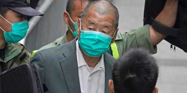 FILE - In questo feb. 9, 2021, file di foto, democracy advocate Jimmy Lai leaves the Hong Kong's Court of Final Appeal in Hong Kong. (AP Photo/Kin Cheung)