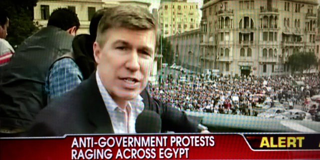Greg Palkot live with protesters on the street in Cairo prior to attack.