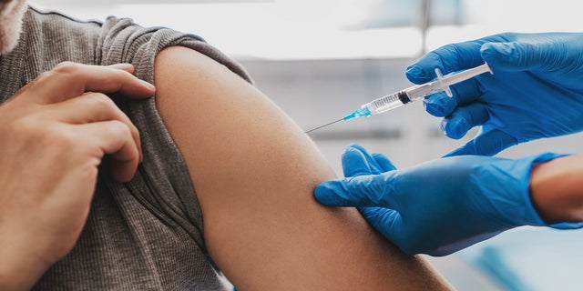 The coronavirus variant lent a "moderate" reduction in neutralizing power from the recently-approved vaccines, study authors said. 