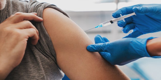 The coronavirus variant lent a "moderate" reduction in neutralizing power from the recently-approved vaccines, study authors said. 