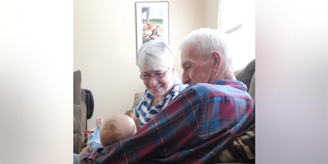 Dee and Mickey Newman and one of their grandsons.
