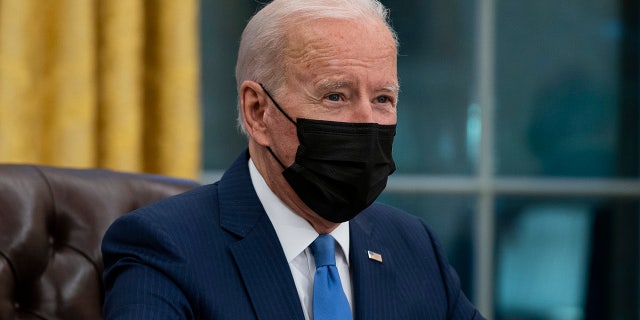 President Joe Biden delivers remarks on immigration in the Oval Office of the White House, Tuesday, Feb. 2, 2021, in Washington. (AP Photo/Evan Vucci)