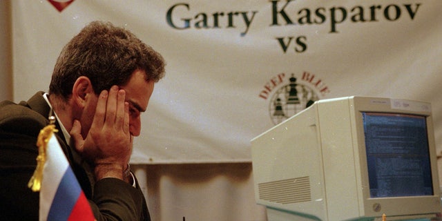 Garry Kasparov ponders his chess moves vs.  IBM's Deep Blue on Feb.13, 1996 in Philadelphia, Pennsylvania (AP Photo/George Widman)