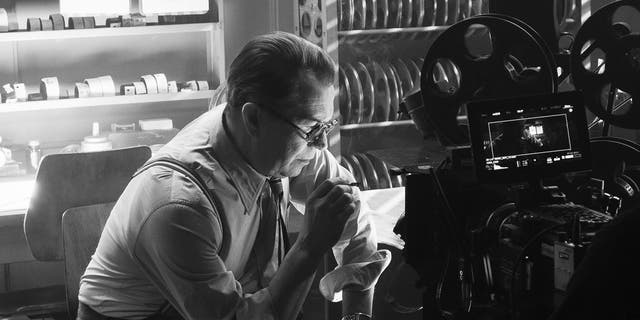 In this image released by Netflix, Gary Oldman portrays Herman Mankiewicz in a scene from 'Mank.' On Wednesday, Feb. 3, 2021 the film was nominated for a Golden Globe for best motion picture drama. 