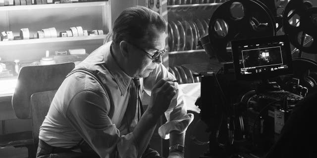In this image released by Netflix, Gary Oldman portrays Herman Mankiewicz in a scene from 'Mank.' On Wednesday, Feb. 3, 2021 the film was nominated for a Golden Globe for best motion picture drama.