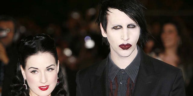 Dita Von Teese (left) has spoken out about the abuse allegations brought against her ex-husband Marilyn Manson (right). She said that she did not experience abuse during their seven-year relationship. (Photo by Richard Lewis/WireImage)